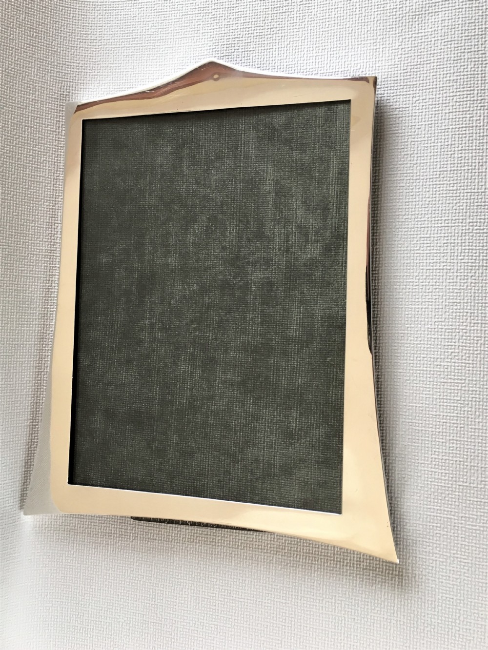 A handsome shaped silver photo frame View IV
