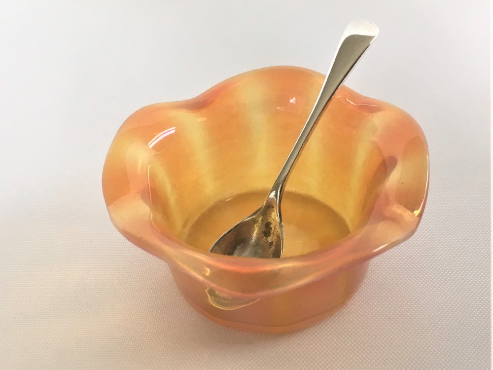 A Victorian Vaseline glass salt & silver spoon 