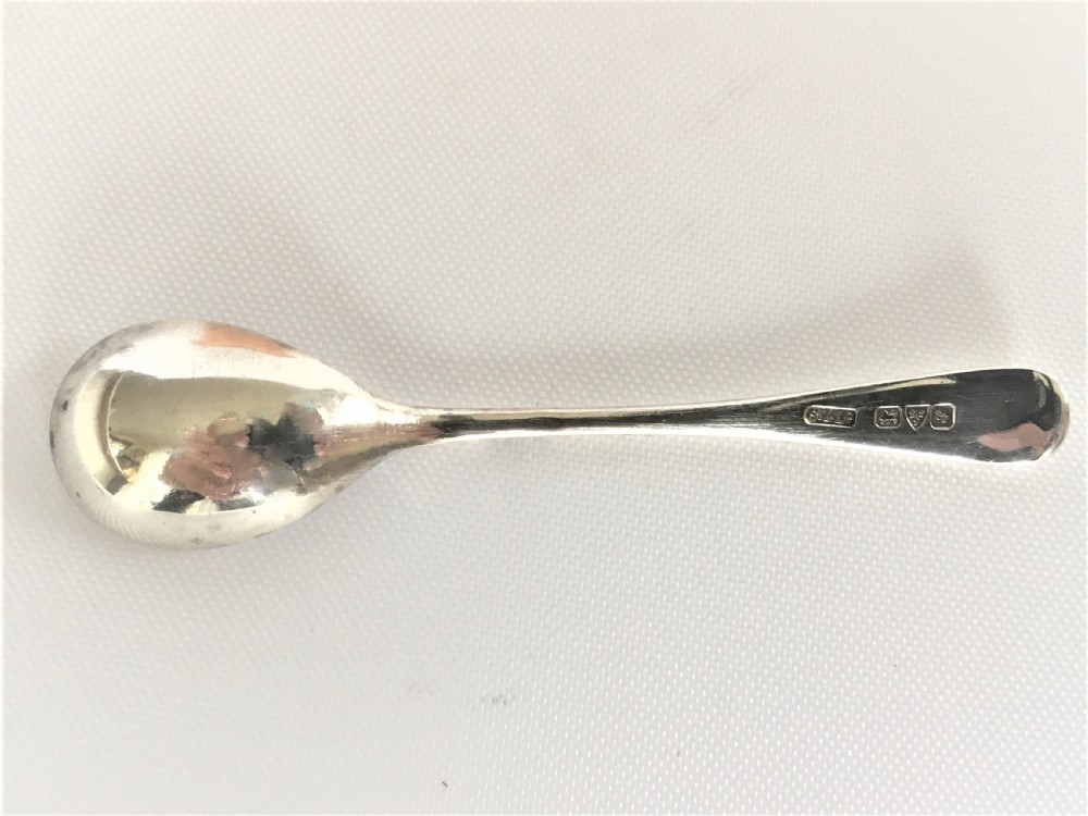 A Victorian Vaseline glass salt & silver spoon  View VI