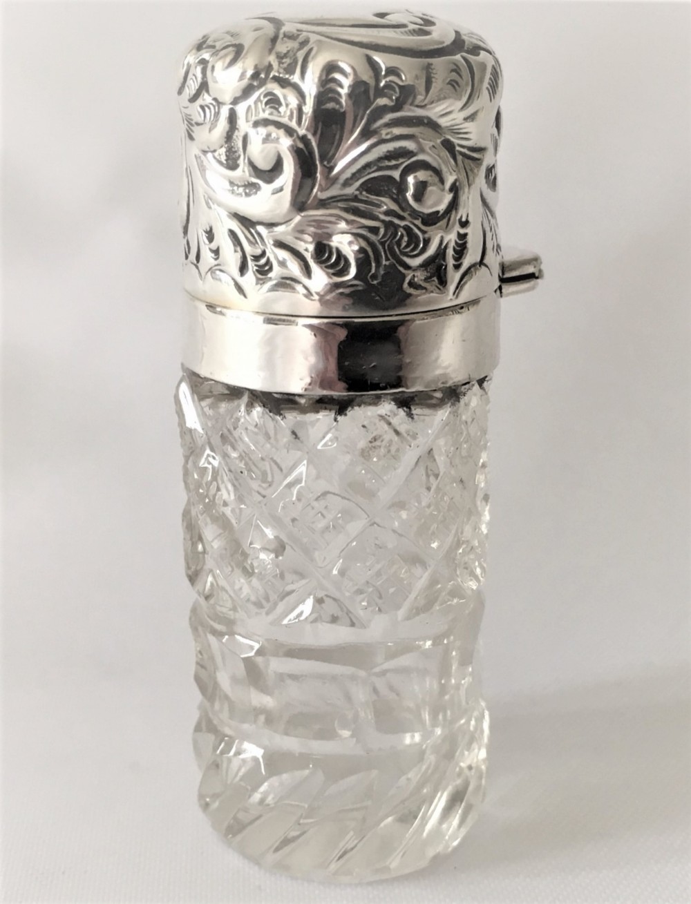 A lovely Victorian silver mounted scent bottle