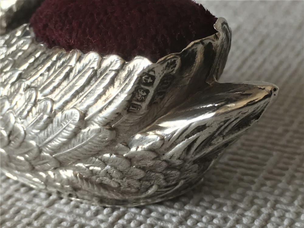An Edwardian silver swan pin cushion View VII