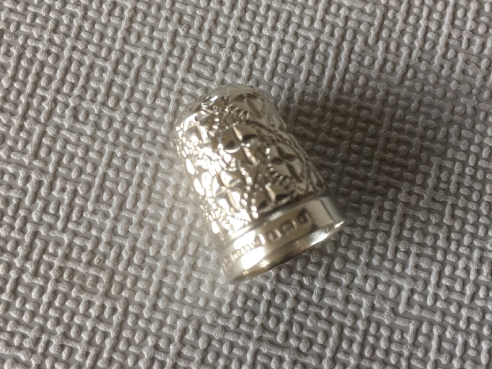 A cased pair of Victorian silver sewing scissors & thimble View VI