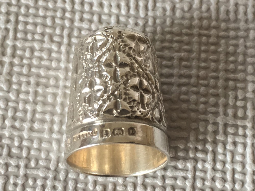 A cased pair of Victorian silver sewing scissors & thimble View VII