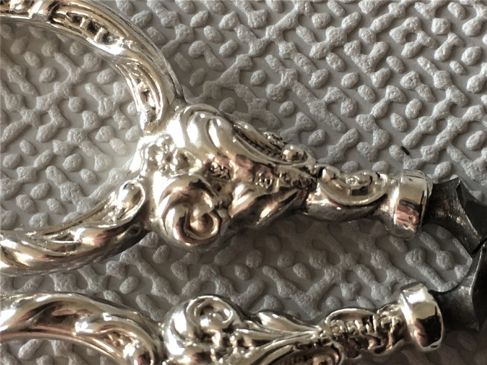 A cased pair of Victorian silver sewing scissors & thimble View IX
