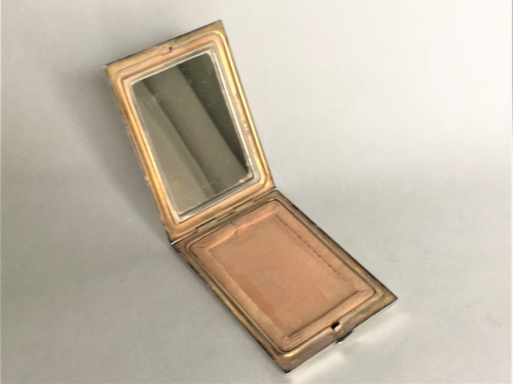  A stylish Art Deco silver & gold compact View IV