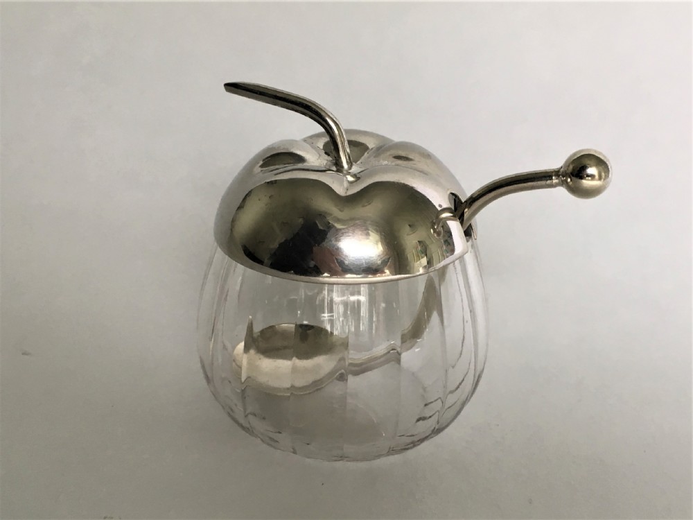 A charming silver plated & glass apple sauce pot