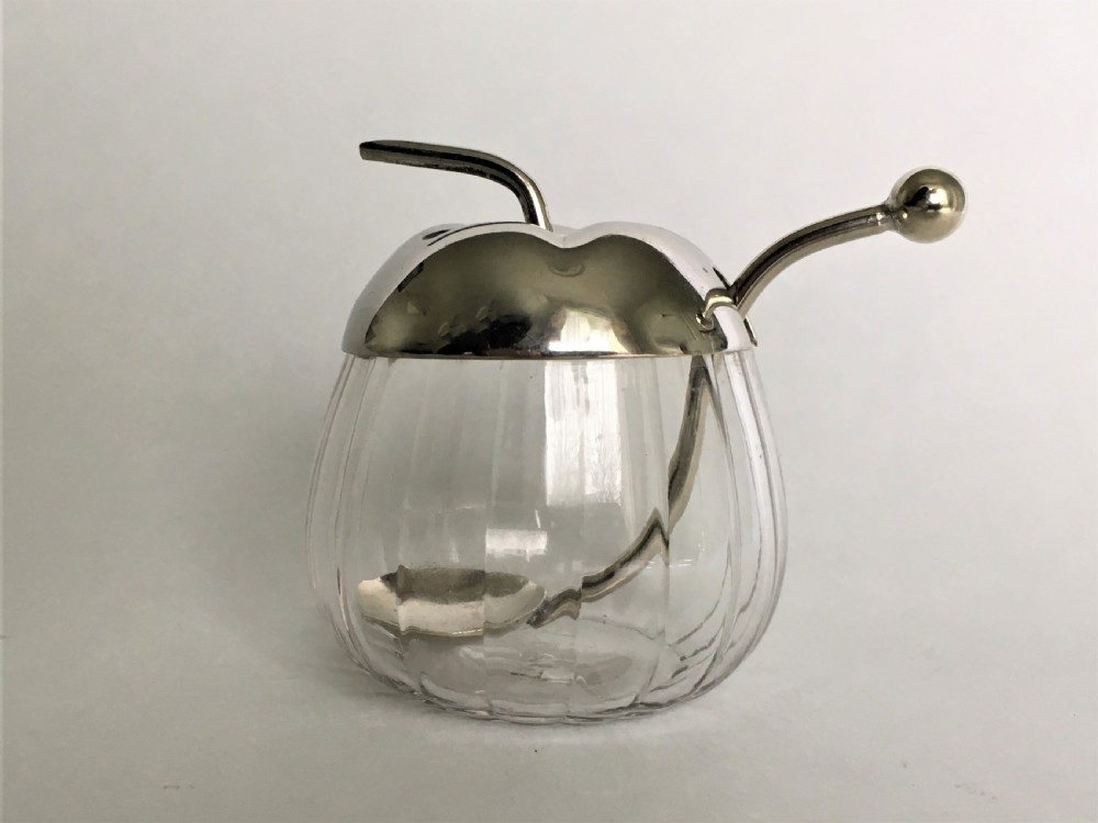 A charming silver plated & glass apple sauce pot View III