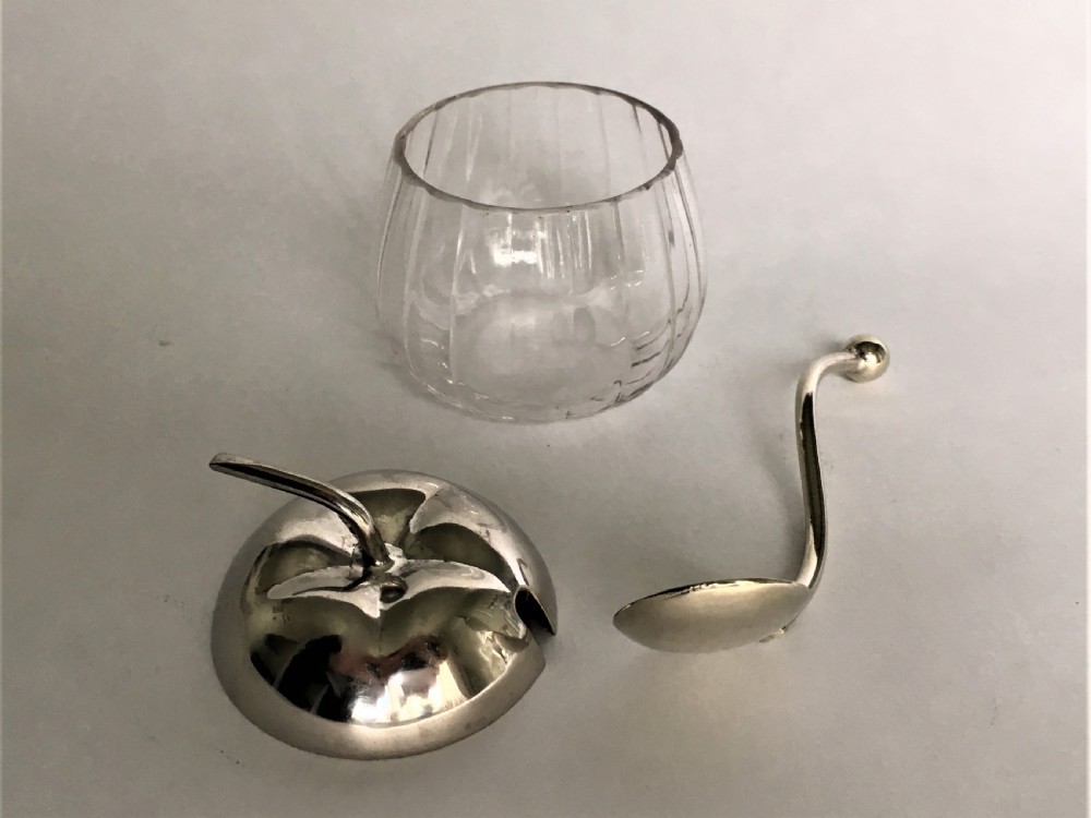 A charming silver plated & glass apple sauce pot View V