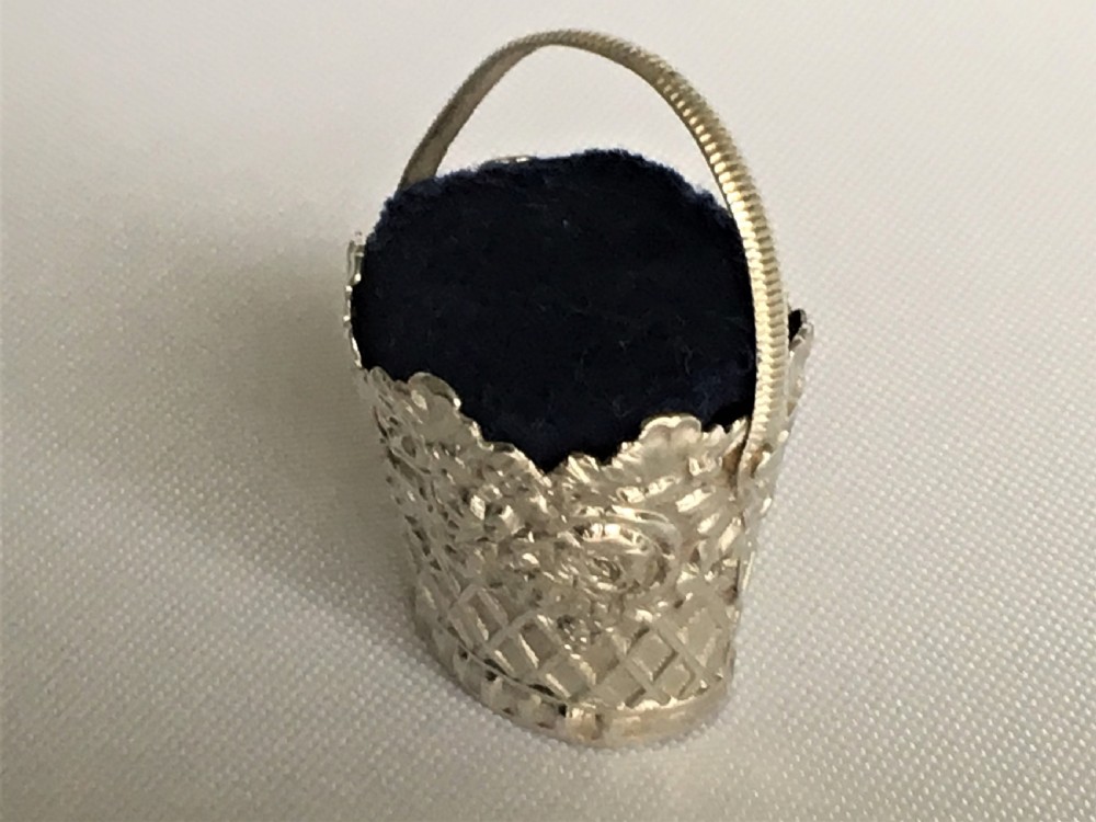 A Georgian silver basket pincushion View II