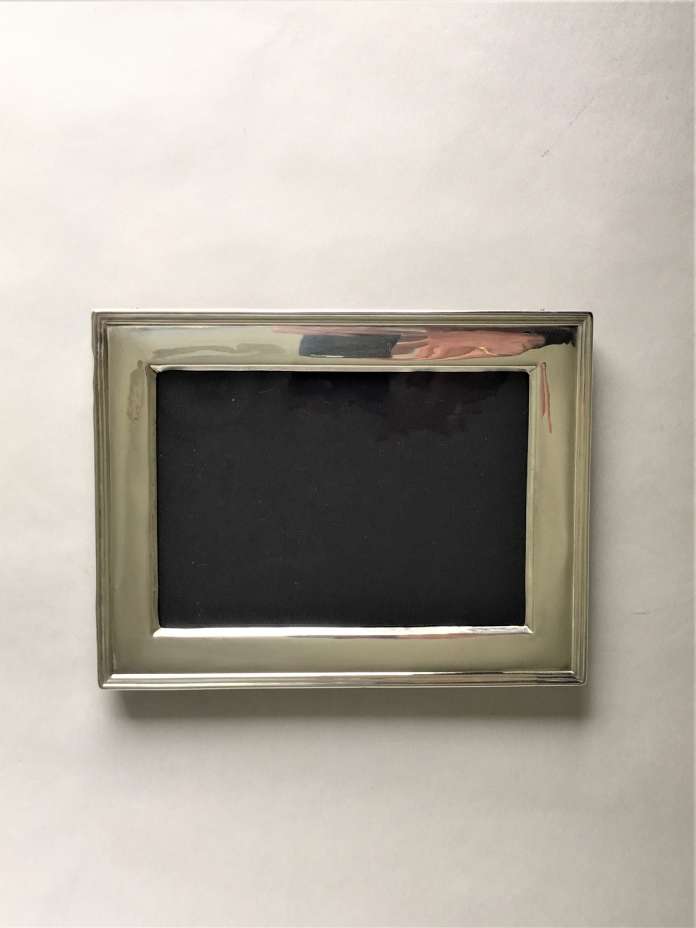 A landscape/portrait silver photo frame View IX