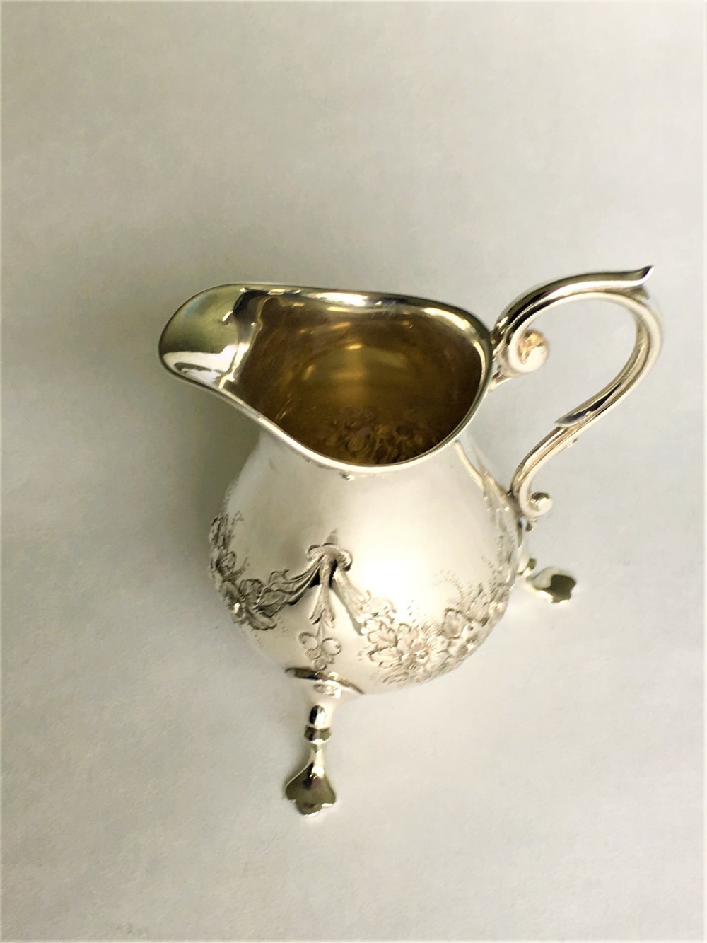 A pretty Victorian small silver cream jug View II