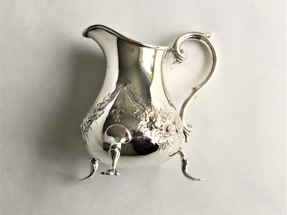 A pretty Victorian small silver cream jug View III