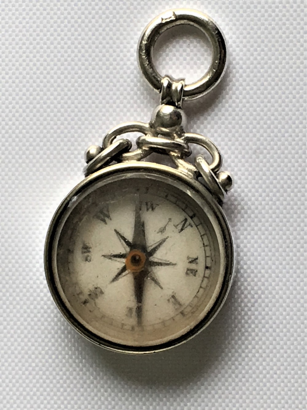 A Victorian silver fob compass View V