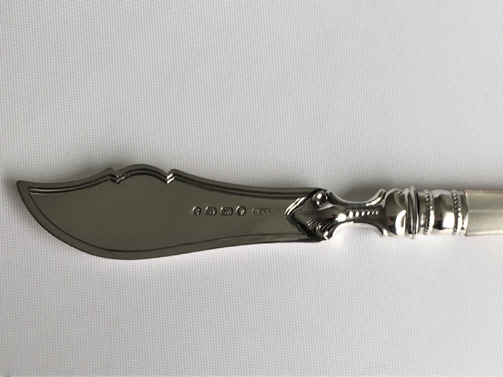A Victorian silver & mother-of-pearl butterknife View II