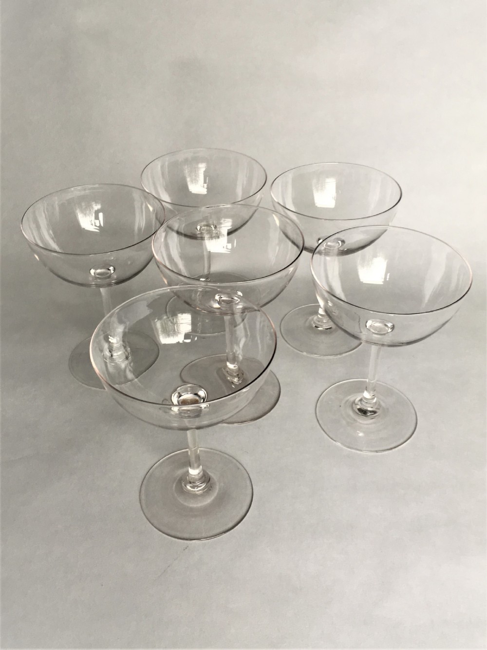A stylish set of 6 Victorian champagne glasses
