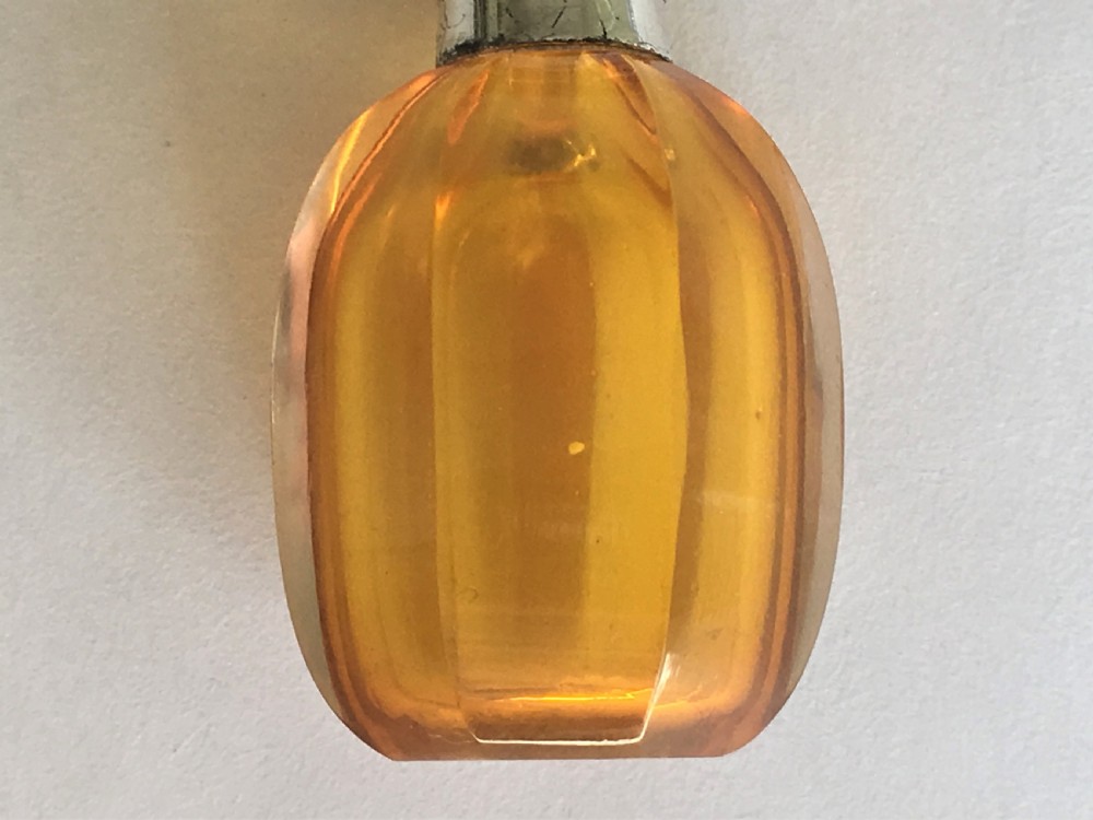 A charming silver mounted amber scent bottle View III