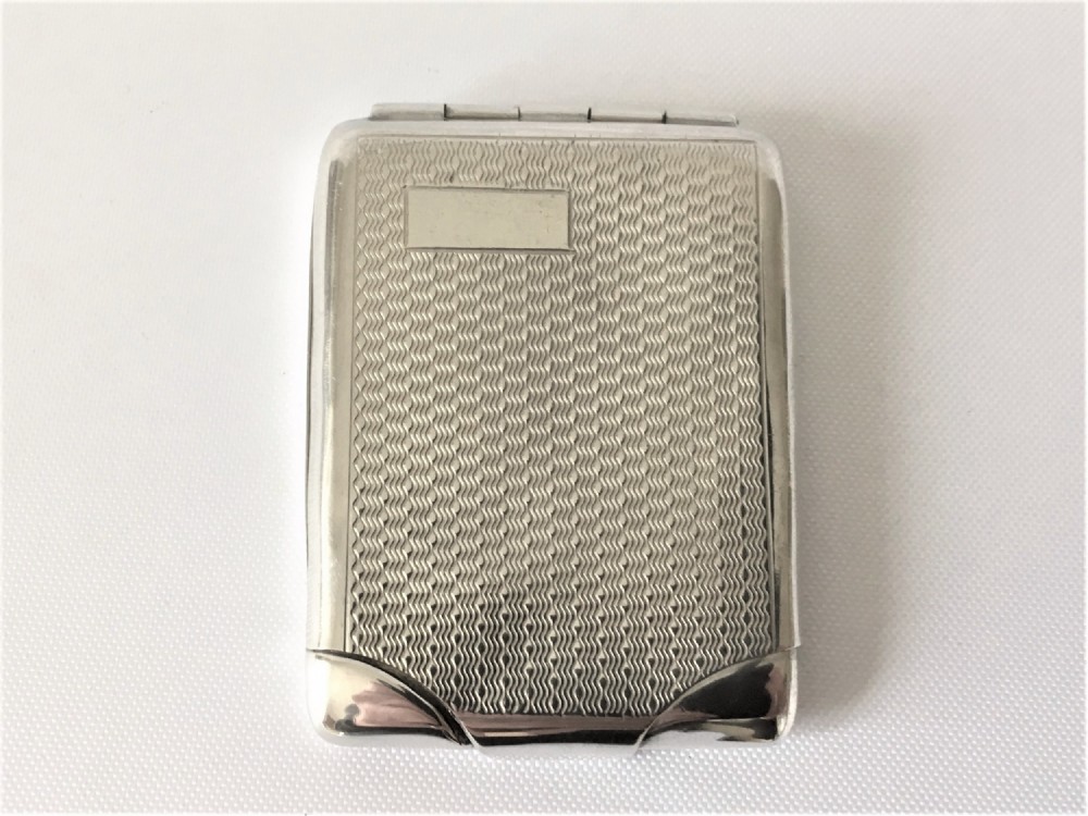 A smart Art Deco silver match book holder
