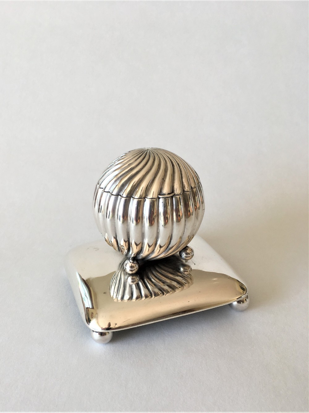 A handsome Victorian silver desk inkwell