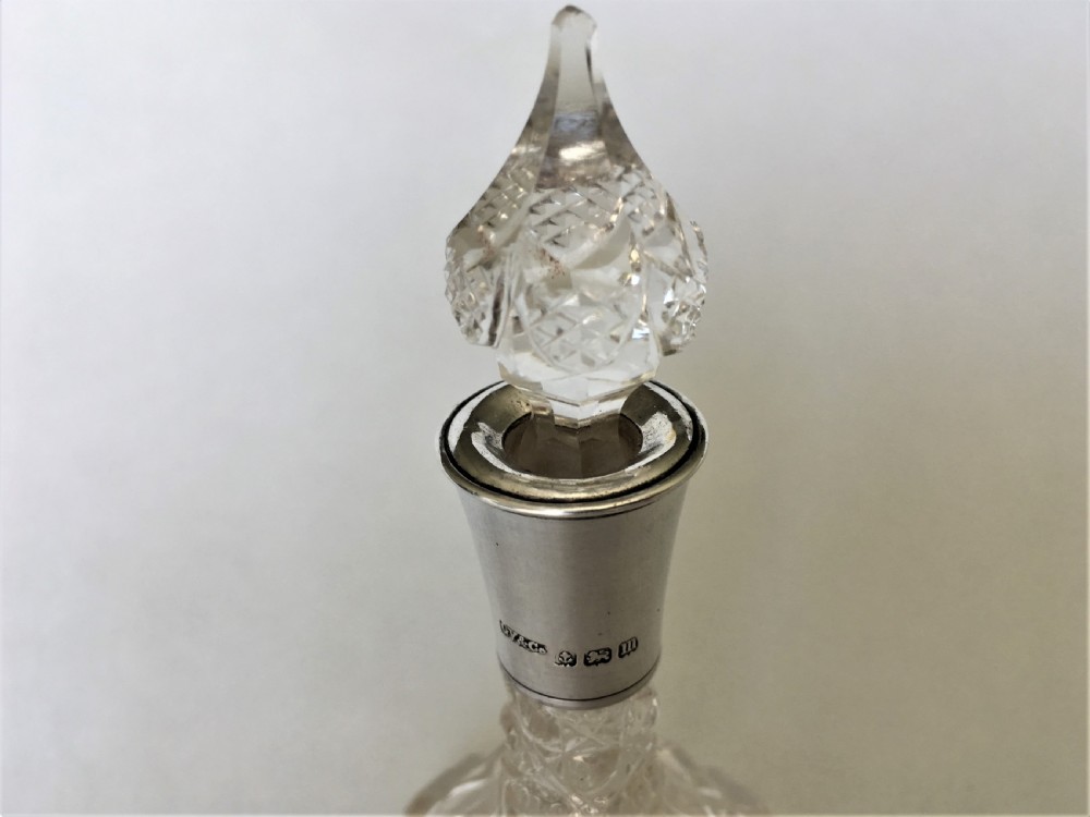 A small George V silver mounted scent bottle View IV