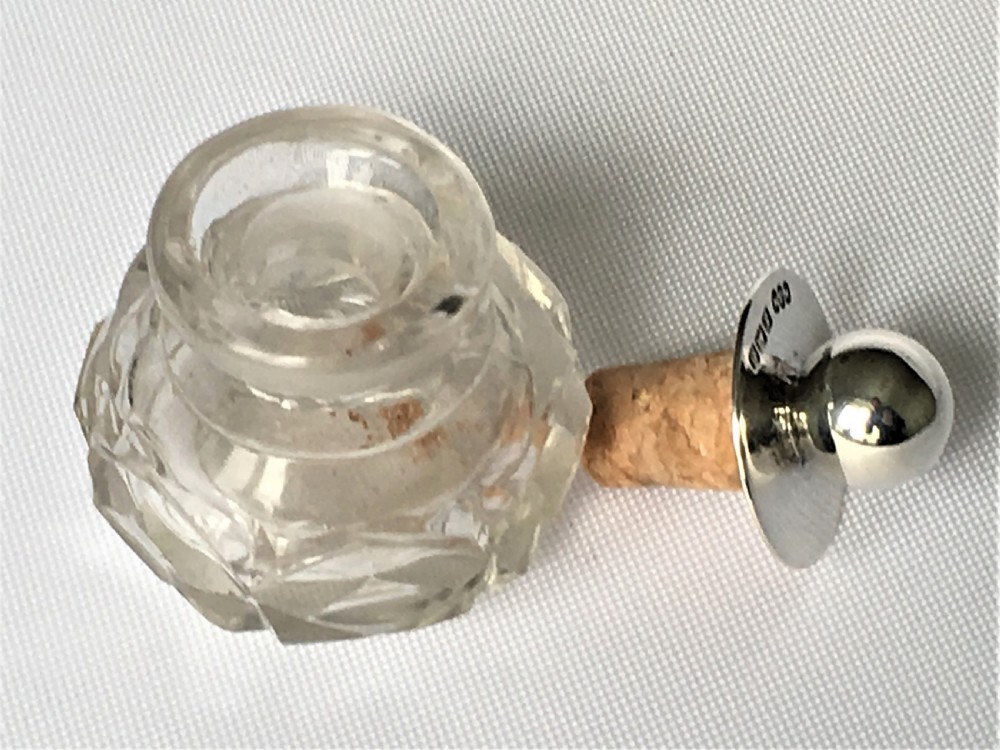 A pretty silver mounted cut glass scent bottle View IV