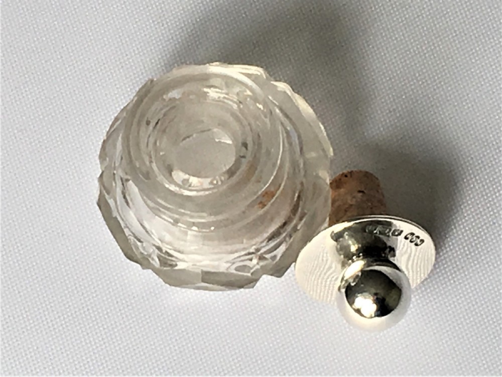 A pretty silver mounted cut glass scent bottle View VI