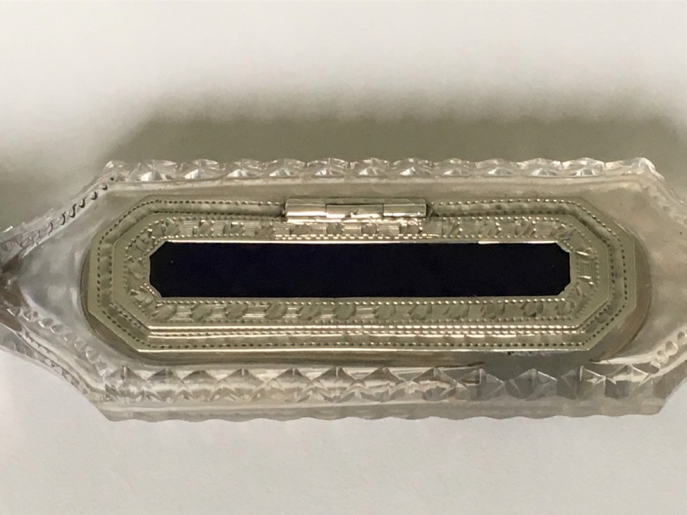 An unusual Victorian silver scent flask with memento compartment View II
