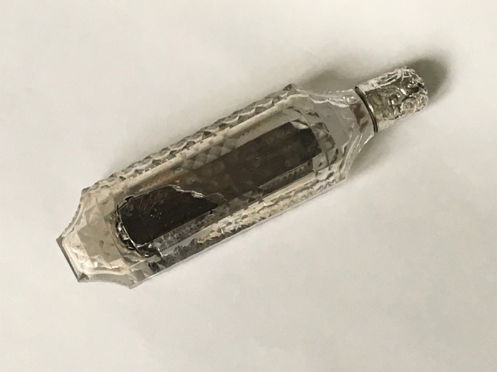 An unusual Victorian silver scent flask with memento compartment View IV