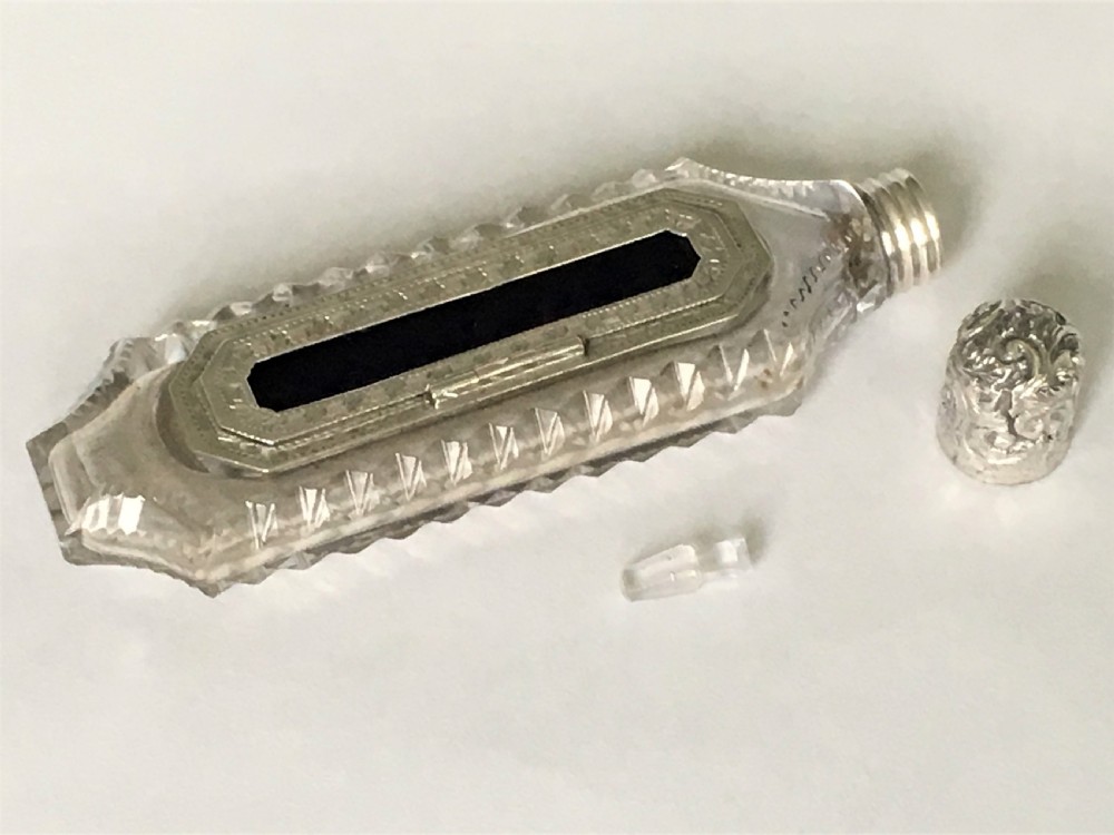 An unusual Victorian silver scent flask with memento compartment View VI