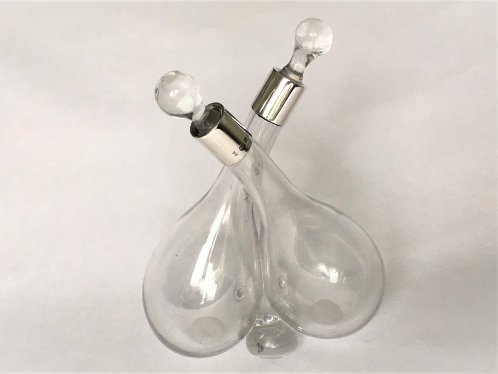 A Victorian silver mounted double oil & vinegar bottle
