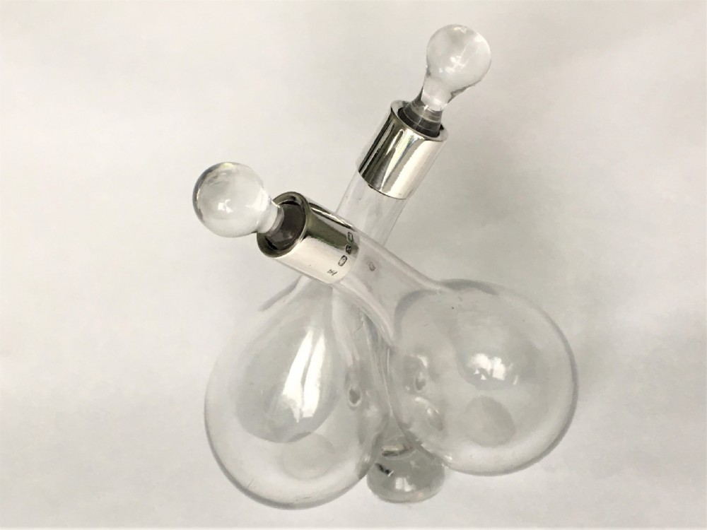 A Victorian silver mounted double oil & vinegar bottle View II