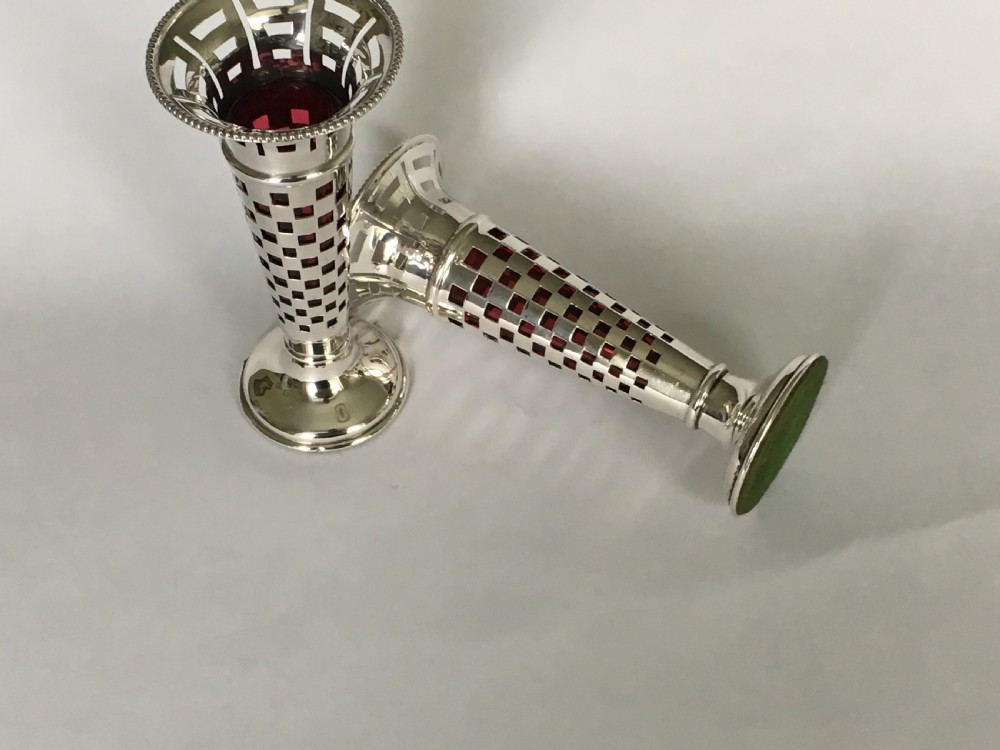 A gorgeous pair of silver & cranberry bud vases View V