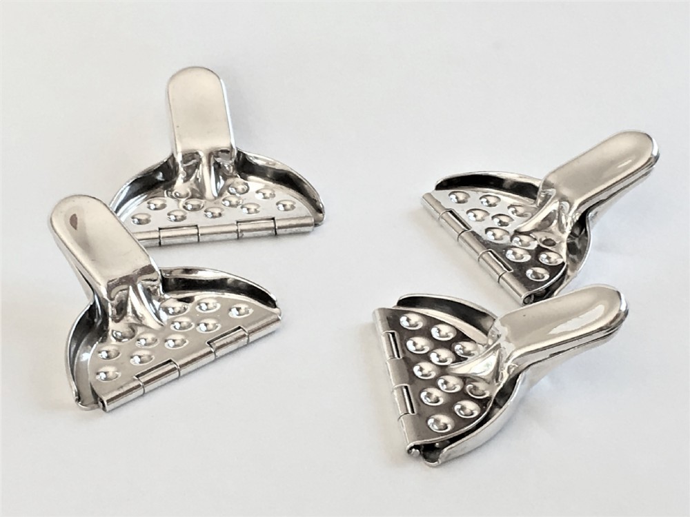 A rare set of 4 WMF silver plated lemon squeezers