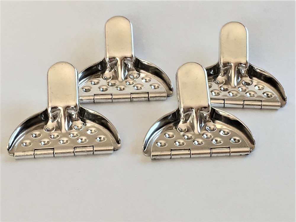 A rare set of 4 WMF silver plated lemon squeezers View II