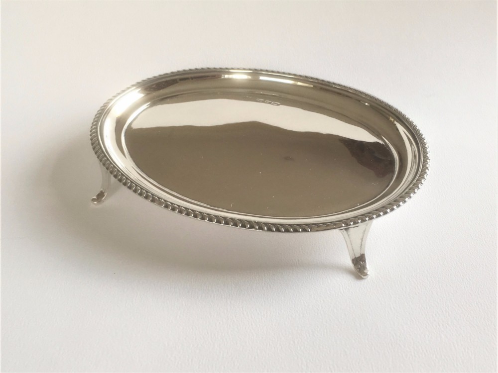 A Georgian revival silver teapot stand