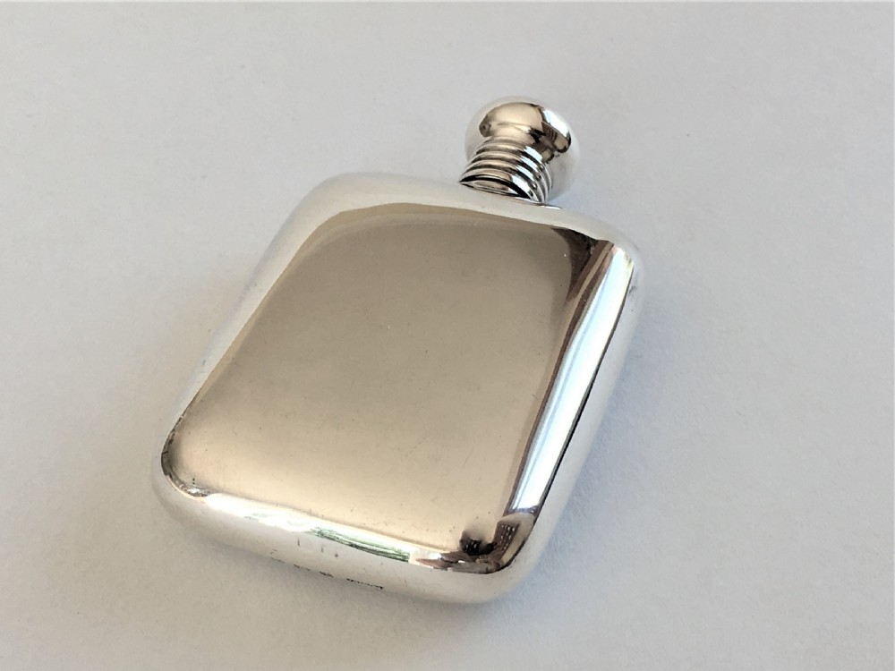A charming 'one shot' silver hipflask View II