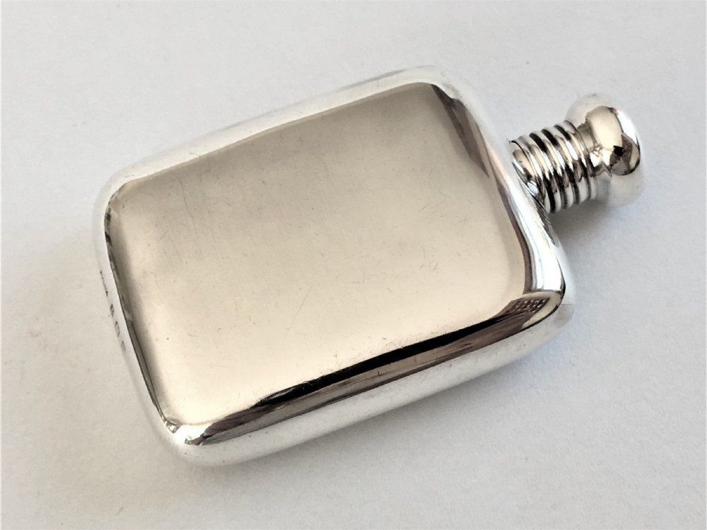 A charming 'one shot' silver hipflask View IV