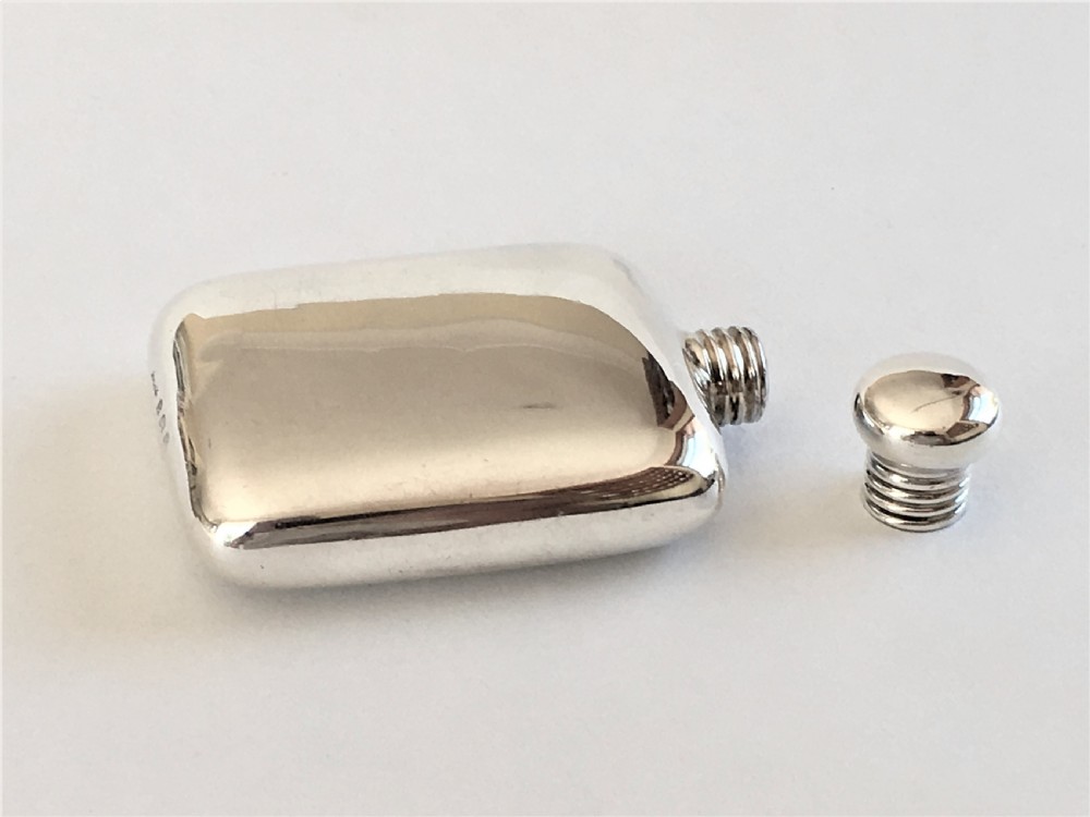 A charming 'one shot' silver hipflask View VI