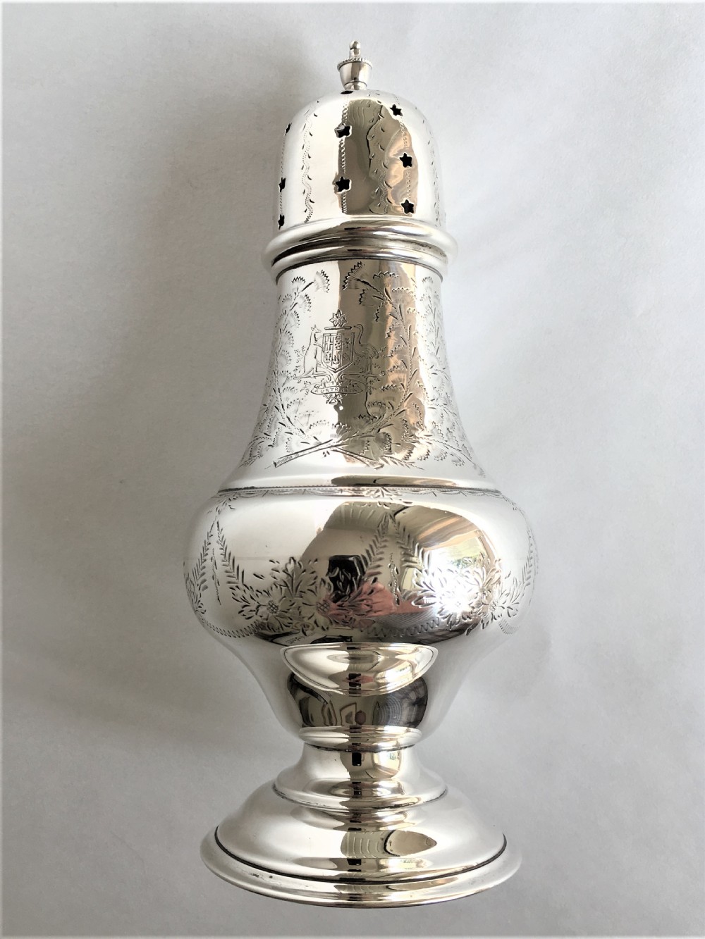 Australian interest. An engraved silver sugar caster View III
