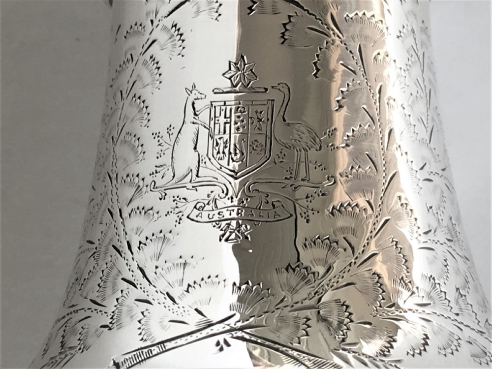 Australian interest. An engraved silver sugar caster View V