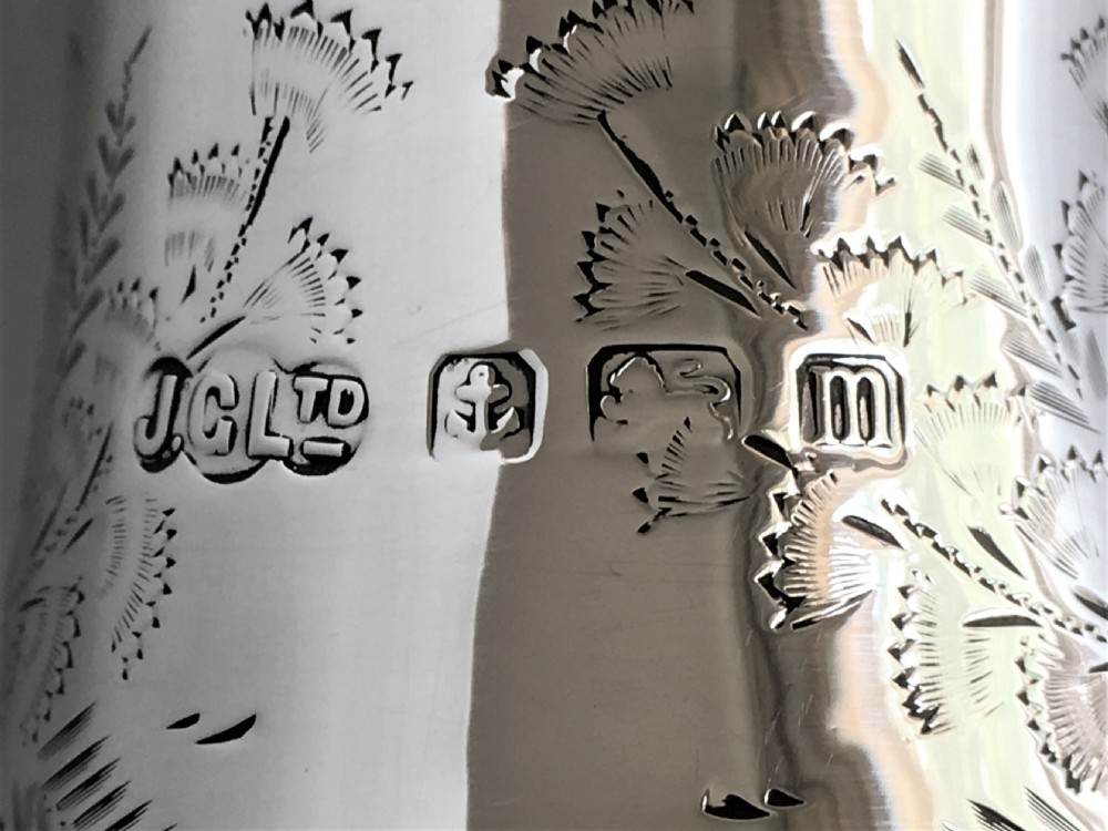 Australian interest. An engraved silver sugar caster View VI