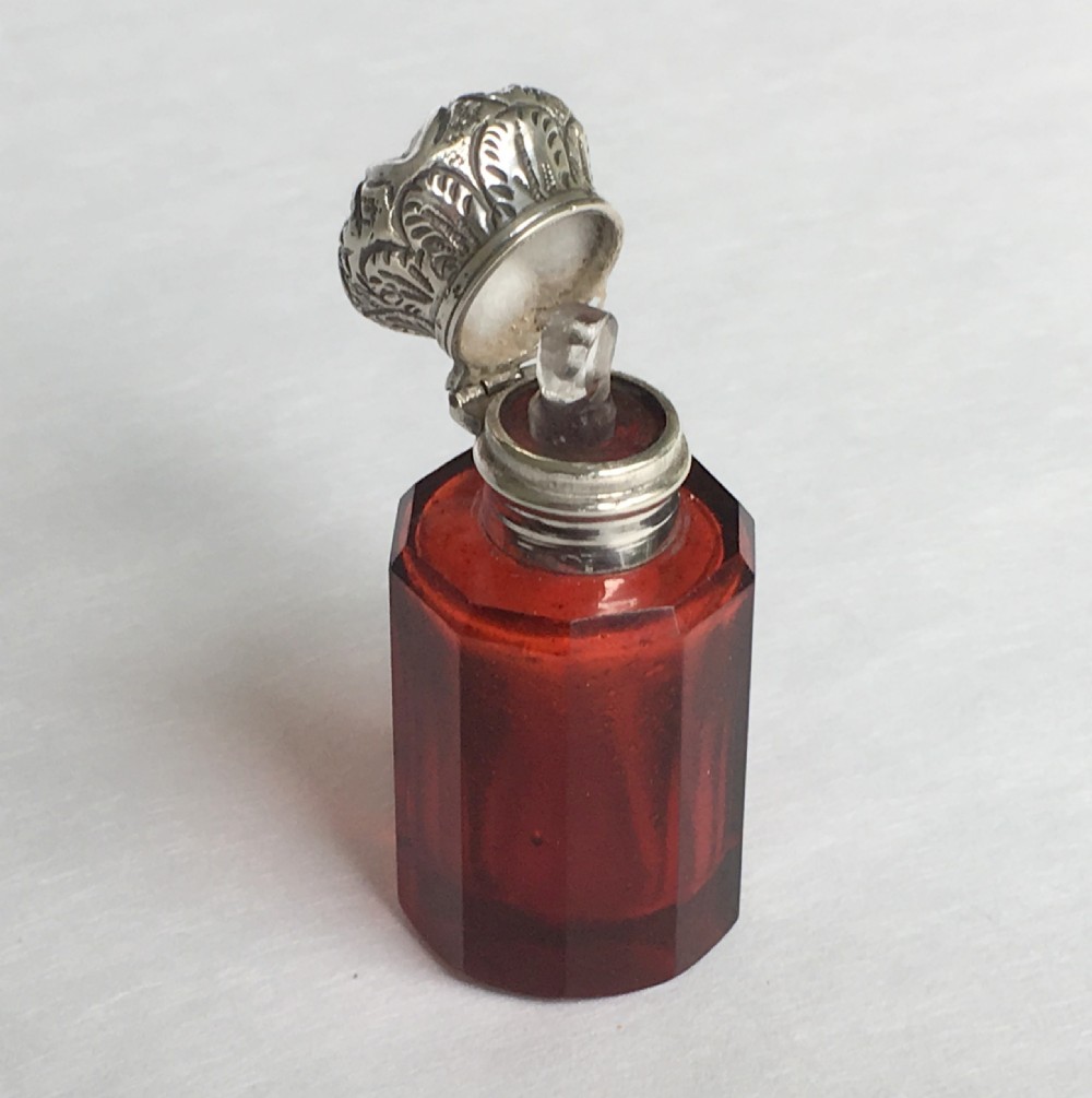 A Victorian silver mounted ruby scent bottle View V