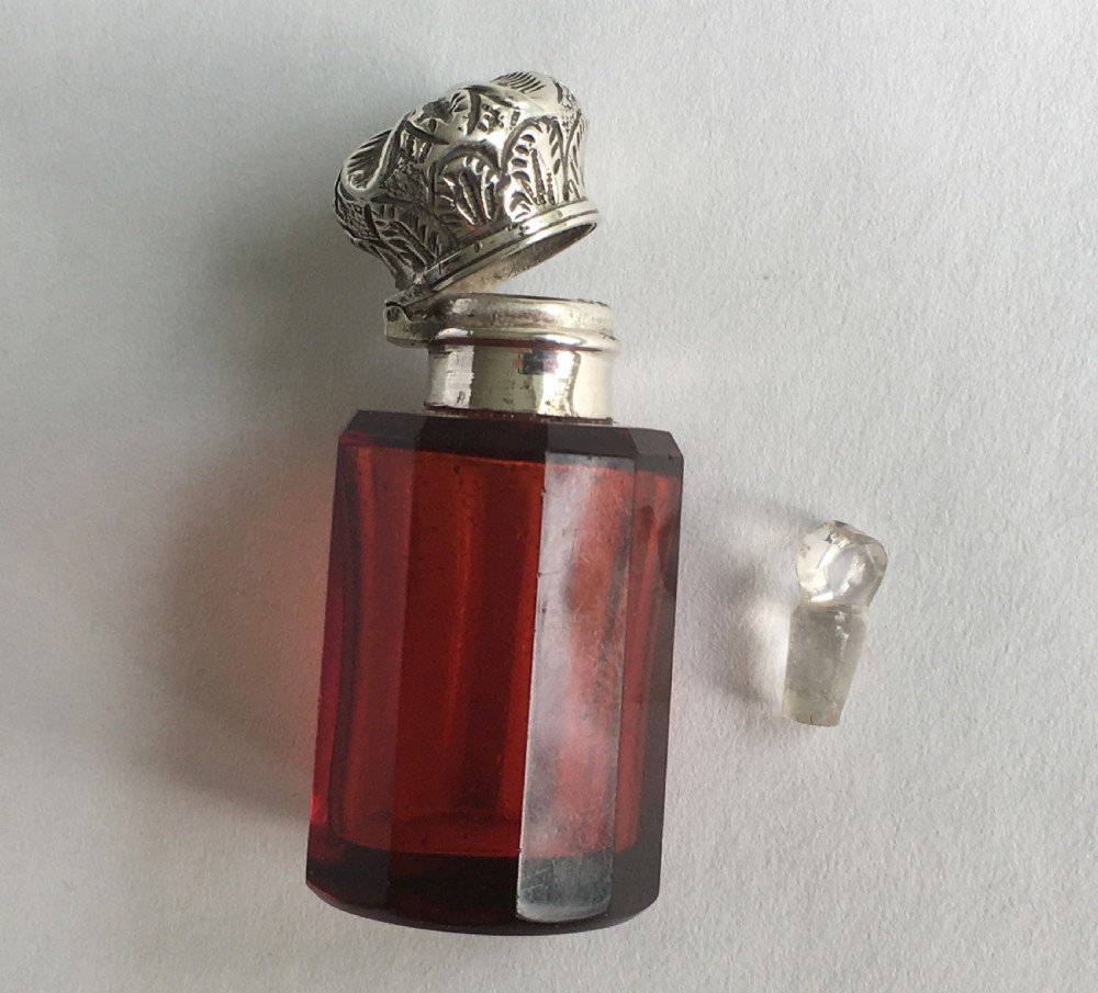 A Victorian silver mounted ruby scent bottle View VII