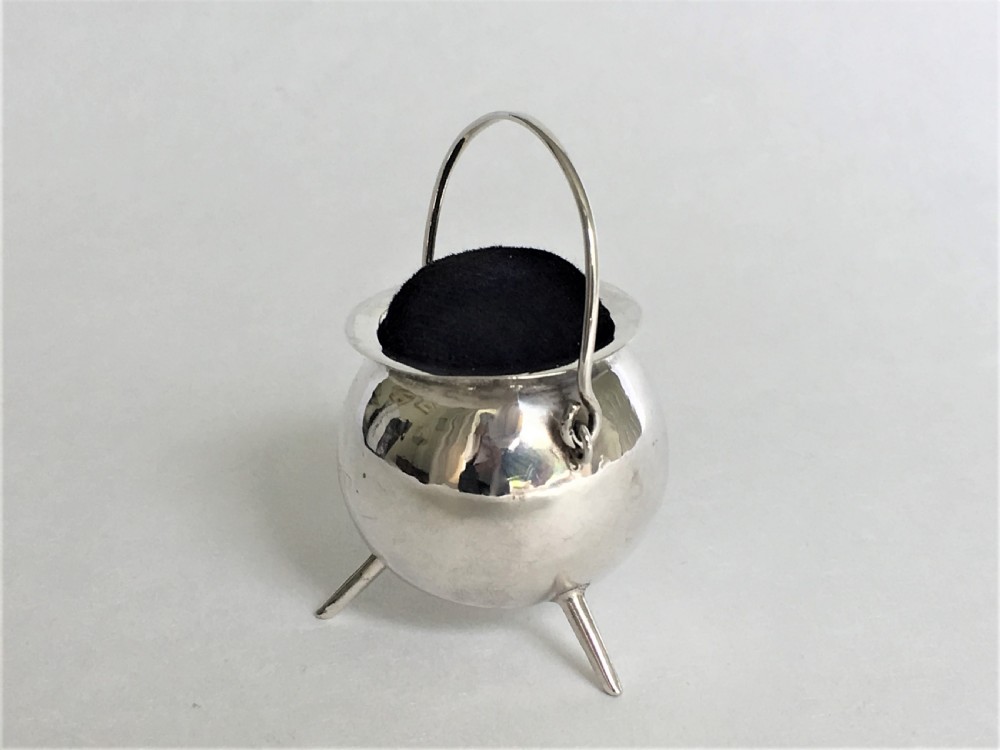 A rare Edwardian novelty silver cauldron pincushion