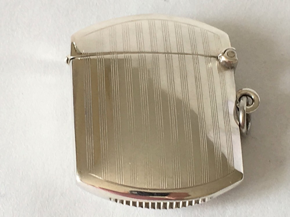 A handsome engine turned silver vesta View II