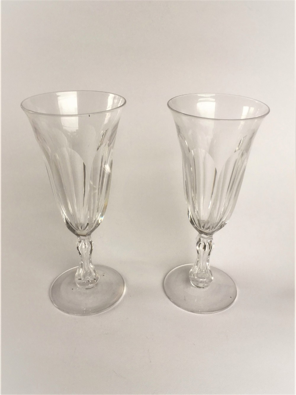 A pair of 19th Century cut glass champagne flutes