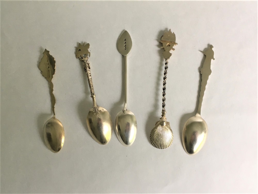A harlequin set of 5 Victorian silver souvenir spoons View II