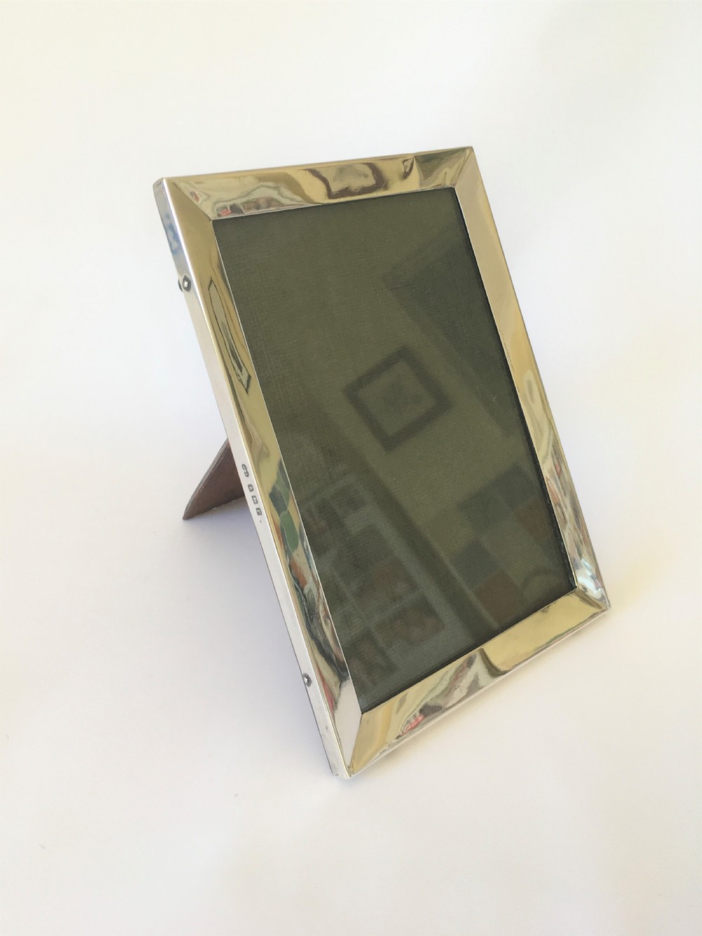 A landscape/portrait silver photo frame View III