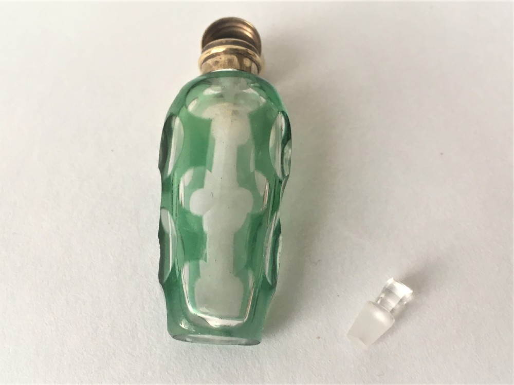 A exquisite Victorian overlay scent bottle with gilt mount View VI
