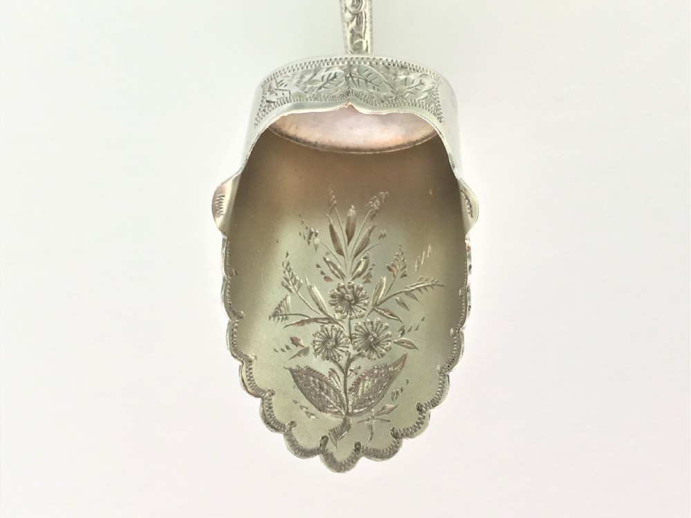 A pretty Victorian silver gilt caddy shovel View VI