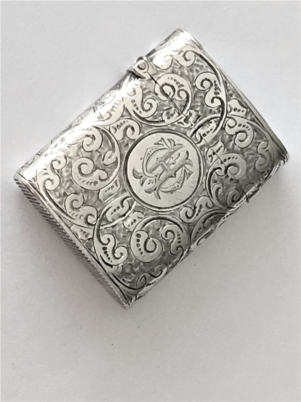 An unusual curved Victorian silver vesta